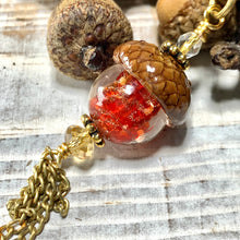 Load image into Gallery viewer, Red Crystal with Gold Flecks Keyring Acorn Charm
