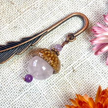 Load image into Gallery viewer, a pair of earrings sitting on top of a table
