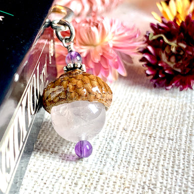 a close up of a key chain on a table