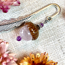 Load image into Gallery viewer, a pair of earrings sitting on top of a table
