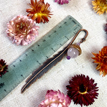 Load image into Gallery viewer, a close up of flowers and a ruler on a table
